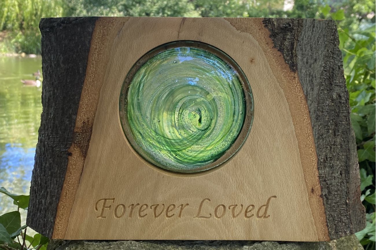 Remembrance Glass Disk with Encased Ashes held in Beech.