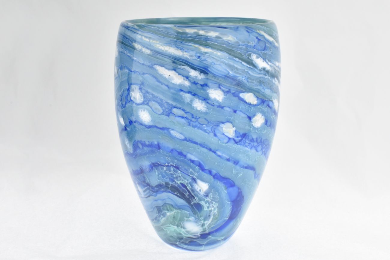 Studio art glass ocean vase in mottled blues